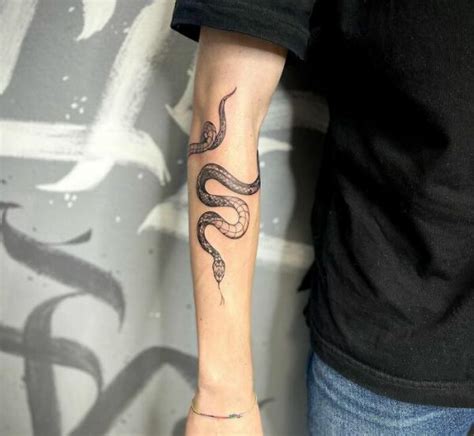 gucci snake tattoos|snake wrapping around forearm tattoo.